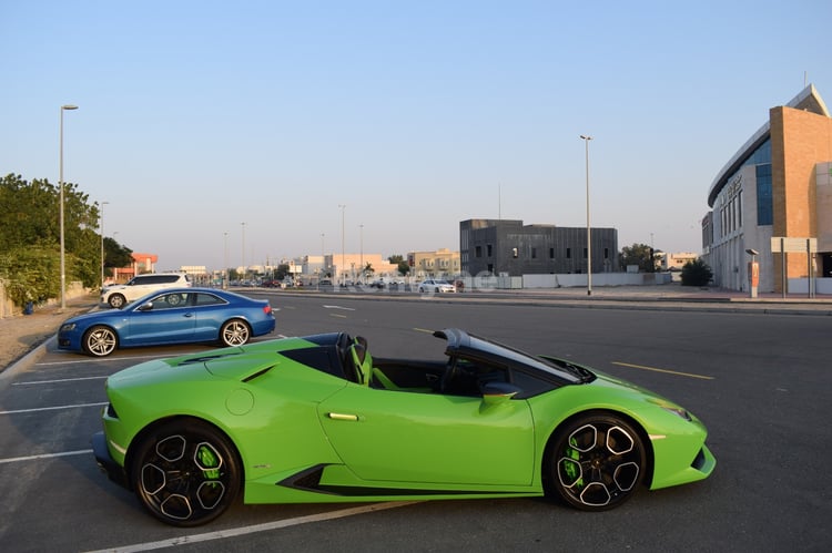 Green Lamborghini Huracan Spider for rent in Dubai 2