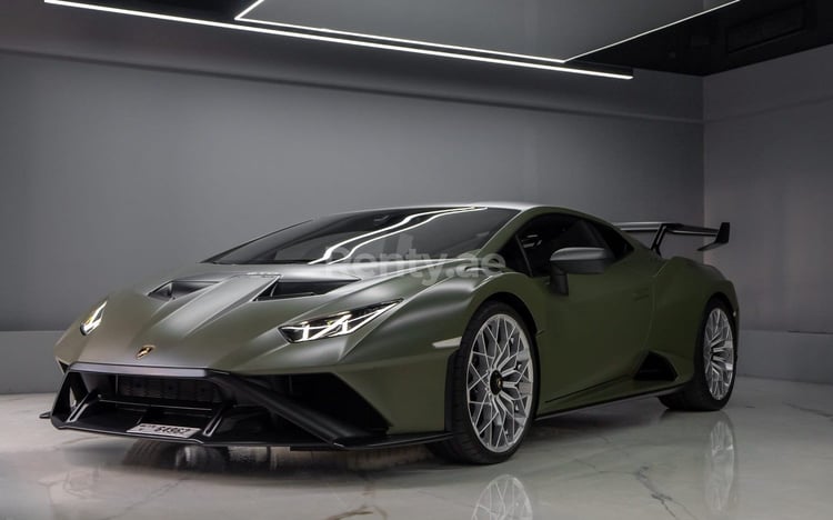 Green Lamborghini Huracan STO for rent in Sharjah