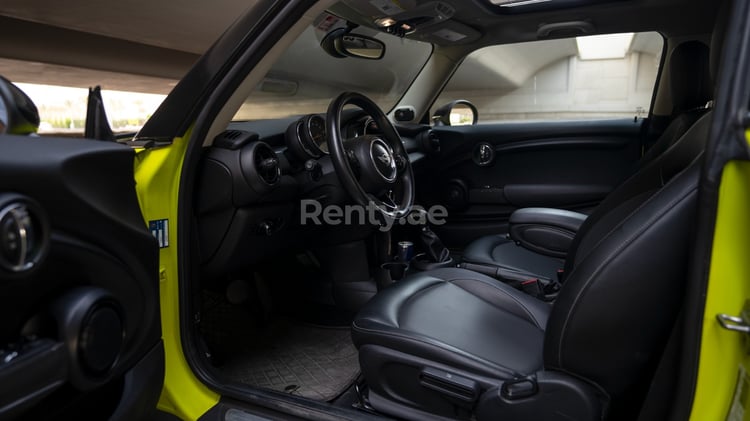 Green Mini Cooper for rent in Sharjah 4