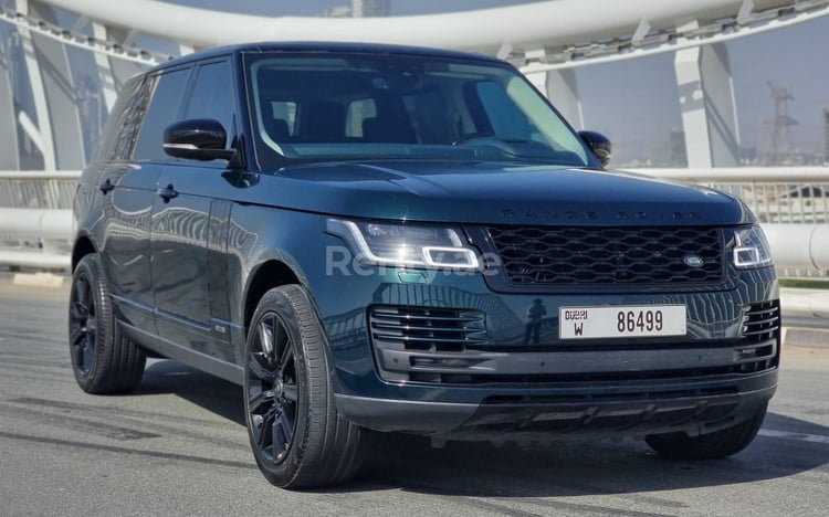 Green Range Rover Vogue L for rent in Sharjah