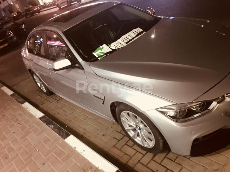 Grey BMW 3 Series for rent in Dubai 2