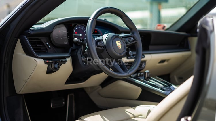 Grey Porsche 911 Carrera Cabrio for rent in Sharjah 6