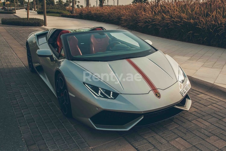 Silver Lamborghini Huracan Spyder LP-610 for rent in Sharjah 3