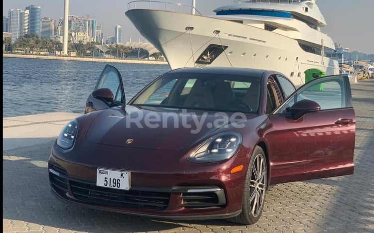 Maroon Porsche Panamera for rent in Dubai