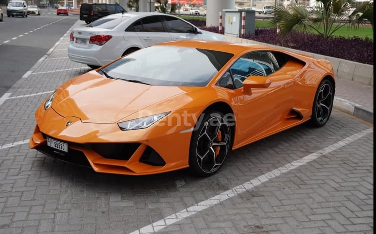 Orange Lamborghini Huracan Evo for rent in Abu-Dhabi