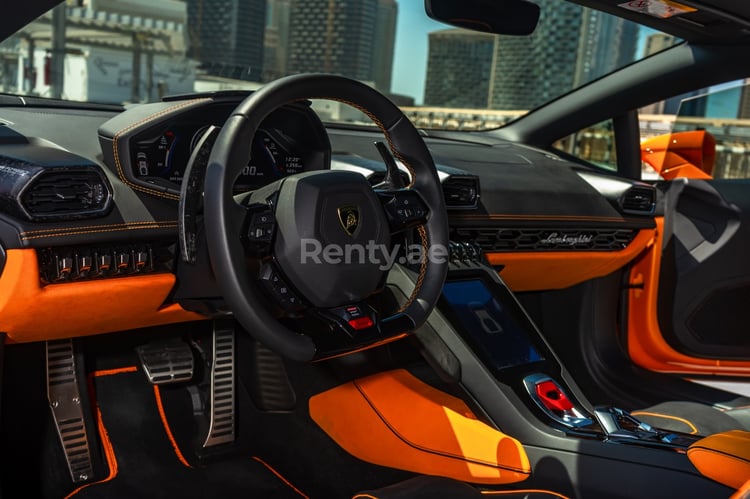 Orange Lamborghini Huracan for rent in Sharjah 4