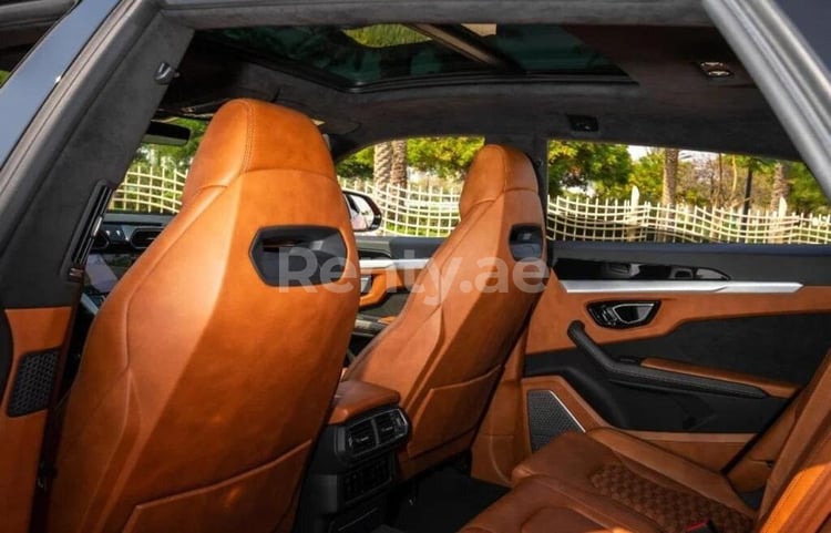 Orange Lamborghini Urus for rent in Abu-Dhabi 2