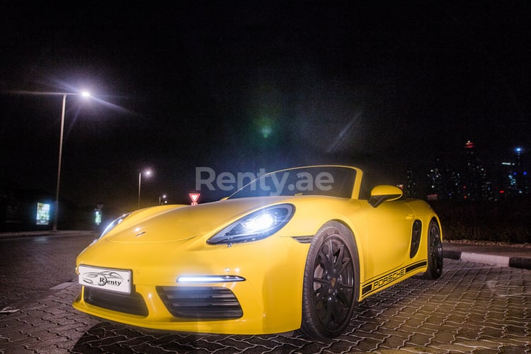 Yellow Porsche Boxster 718 for rent in Dubai 3