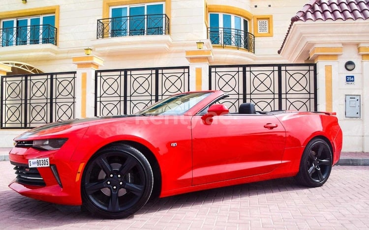 Red Chevrolet Camaro cabrio for rent in Dubai