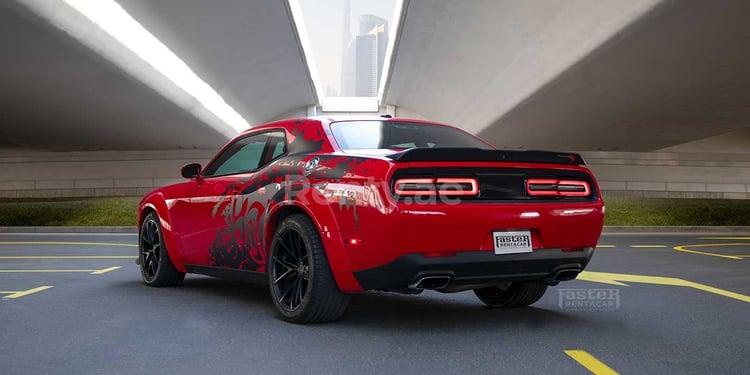 Red Dodge Challenger for rent in Abu-Dhabi 2