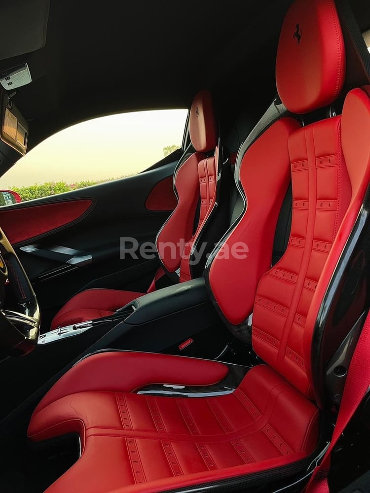 Red Ferrari SF90 for rent in Sharjah 4