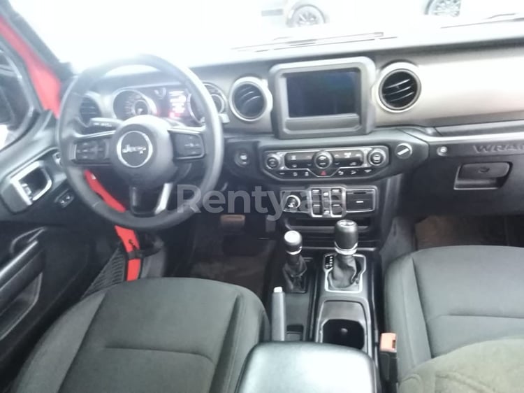 Red Jeep Wrangler for rent in Abu-Dhabi 3