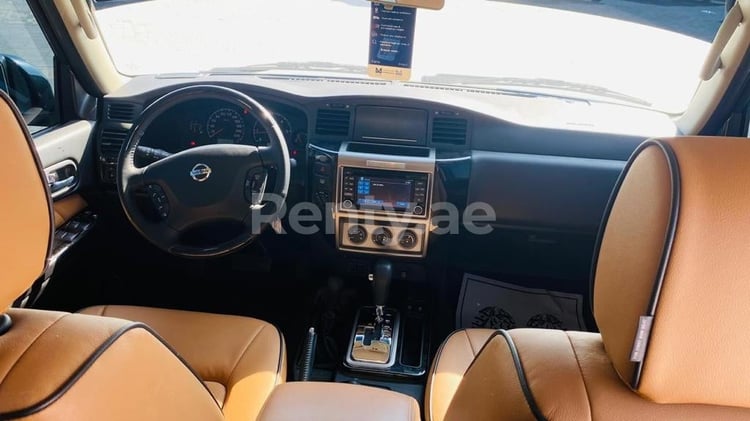 White Nissan Patrol Super Safari for rent in Abu-Dhabi 2