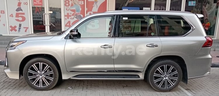 Silver Lexus LX 570 for rent in Sharjah 2