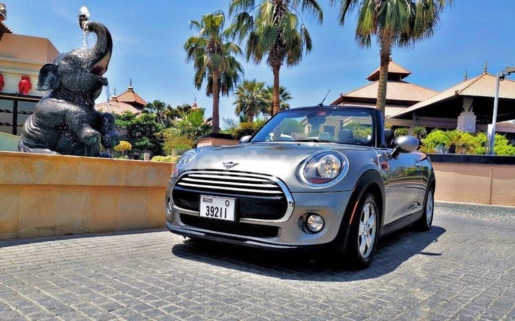 Silver Mini Cooper cabrio for rent in Sharjah