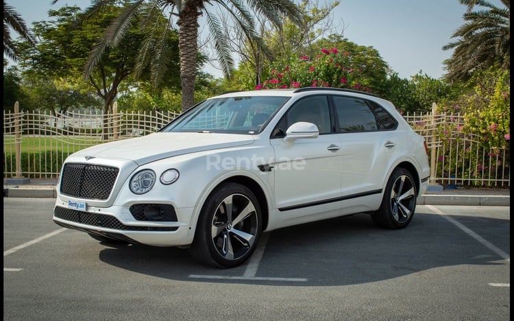 White Bentley Bentayga for rent in Sharjah