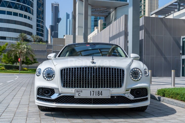 White Bentley Flying Spur for rent in Sharjah 0