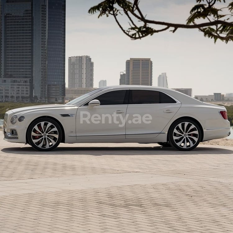 White Bentley Flying Spur for rent in Sharjah 0