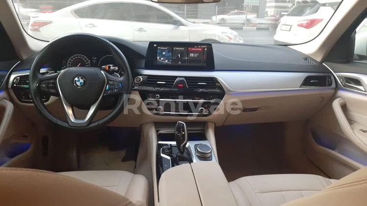 White BMW 520i for rent in Abu-Dhabi 2