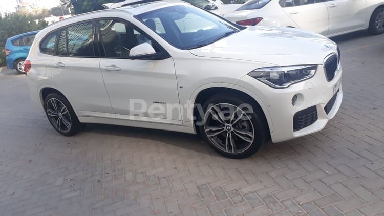 White BMW X1 for rent in Abu-Dhabi 4