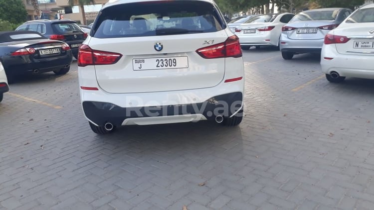 White BMW X1 for rent in Dubai 7