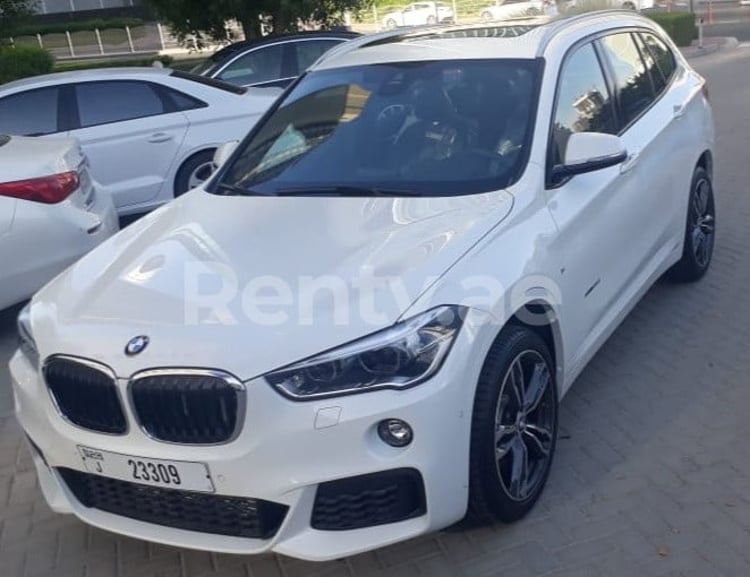 White BMW X1 for rent in Dubai