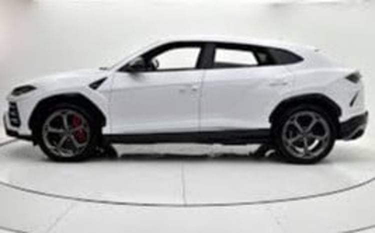 White Lamborghini Urus for rent in Abu-Dhabi