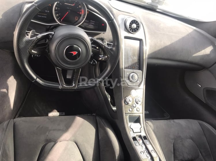 White McLaren 650S Spider for rent in Sharjah 11