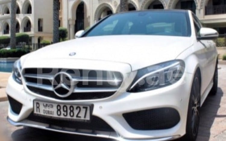 White Mercedes C200 for rent in Dubai