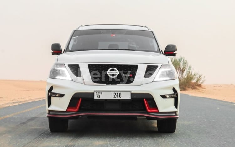 White Nissan Patrol V8 with Nismo Bodykit for rent in Abu-Dhabi