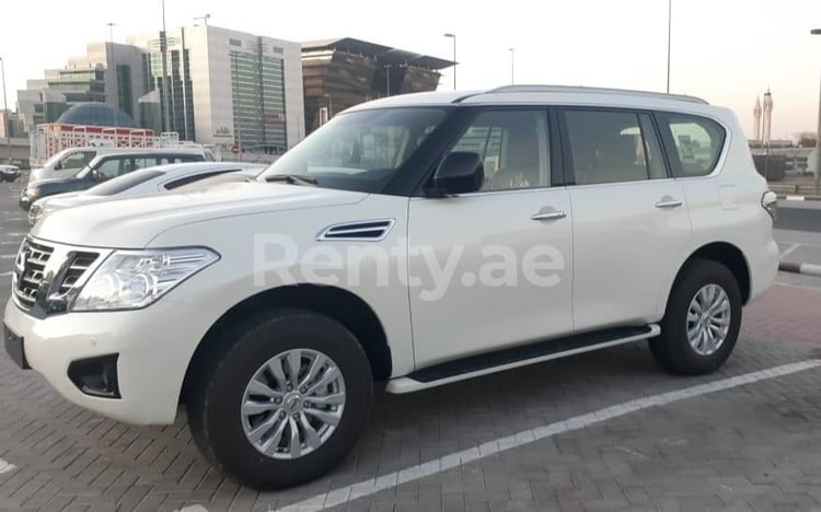 White Nissan Patrol XE for rent in Dubai