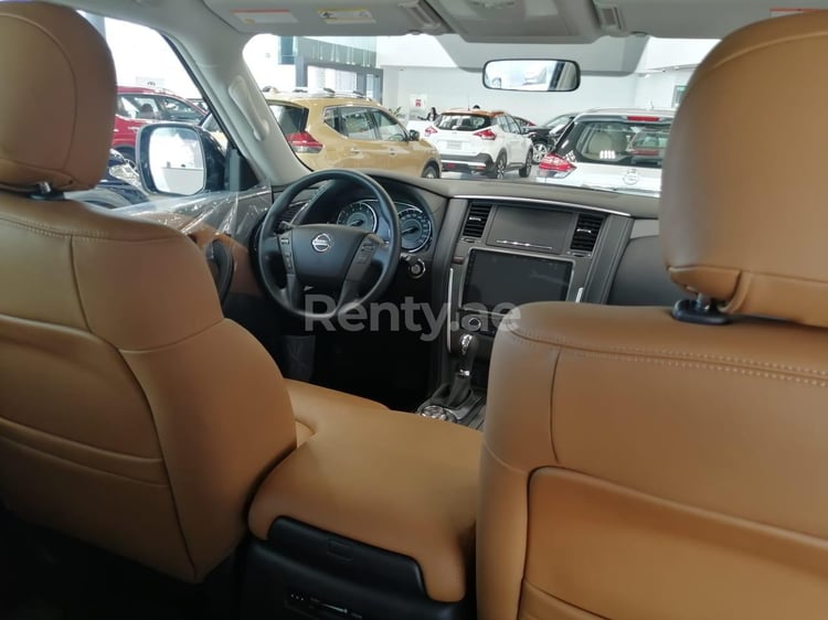 White Nissan Patrol XE for rent in Dubai 4