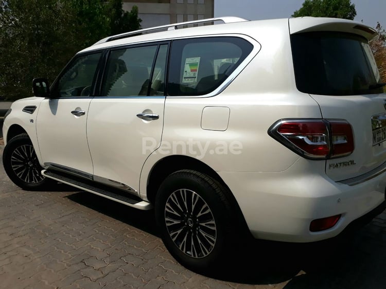 Bright White Nissan Patrol for rent in Abu-Dhabi 5