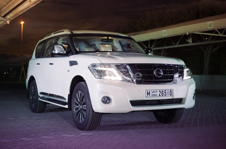 Bright White Nissan Patrol for rent in Dubai 9