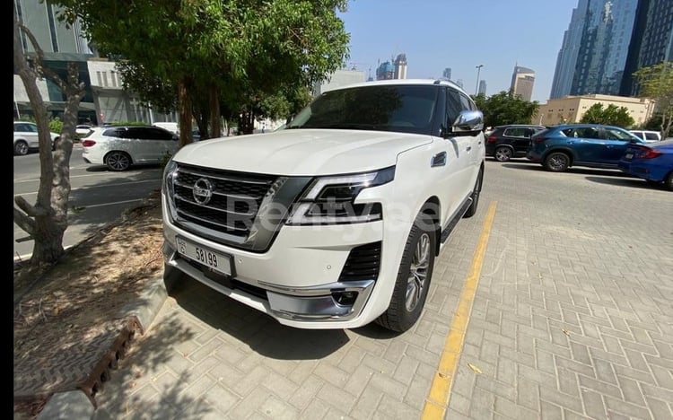 White Nissan Patrol for rent in Abu-Dhabi