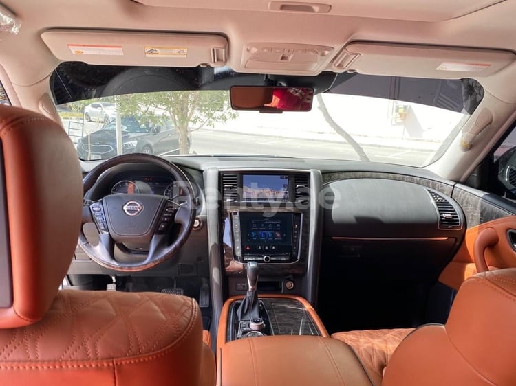 White Nissan Patrol for rent in Abu-Dhabi 1