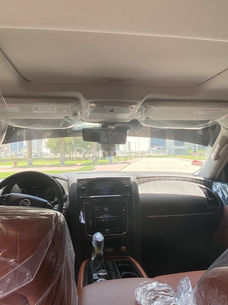 White Nissan Patrol for rent in Abu-Dhabi 2