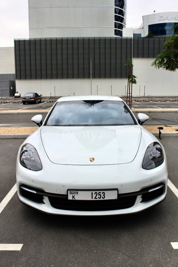 White Porsche Panamera for rent in Dubai 0