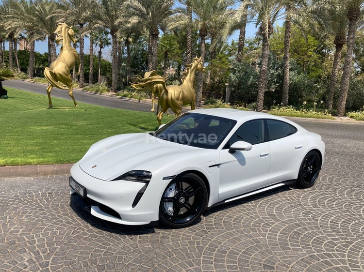 White Porsche Taycan Turbo S for rent in Dubai 0