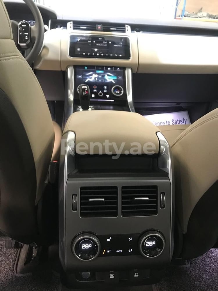 White Range Rover Sport for rent in Dubai 1