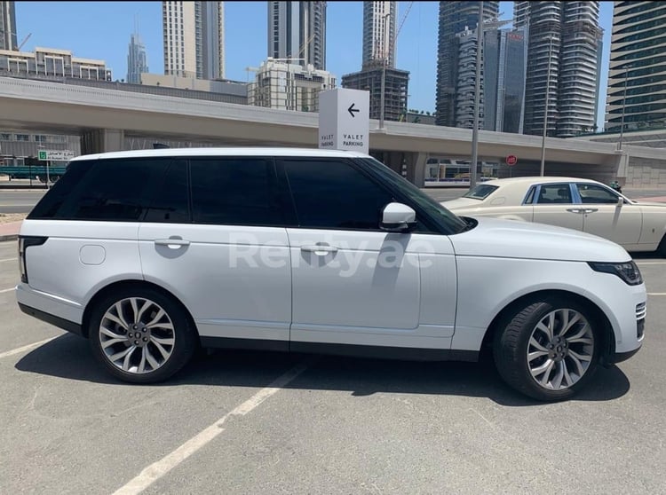 White Range Rover Vogue Supercharged for rent in Dubai 1