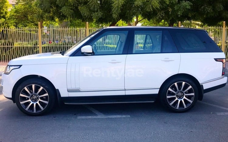 White Range Rover Vogue for rent in Abu-Dhabi