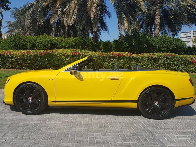 Yellow Bentley Continental GTC for rent in Dubai 1