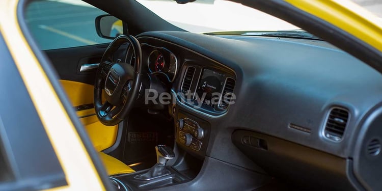 Yellow Dodge Charger for rent in Abu-Dhabi 1