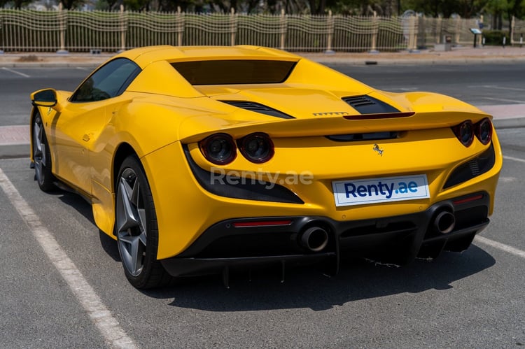 Yellow Ferrari F8 Tributo Spyder for rent in Dubai 3