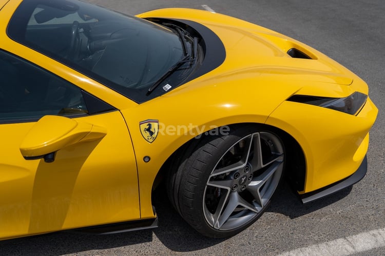 Yellow Ferrari F8 Tributo Spyder for rent in Dubai 4