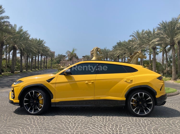 Yellow Lamborghini Urus for rent in Dubai 2