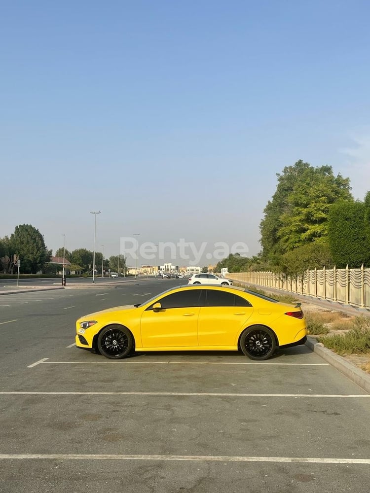 Yellow Mercedes CLA 250 for rent in Dubai 3