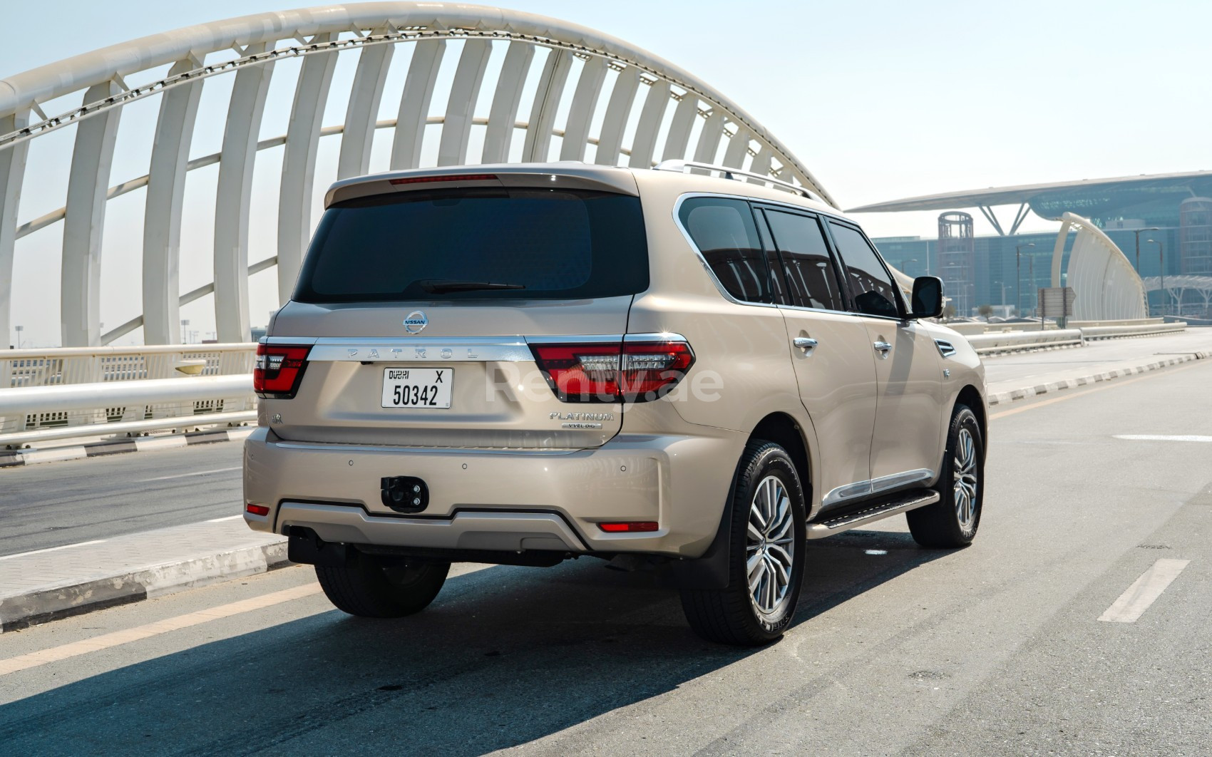 Beige Nissan Patrol V8 Platinum for rent in Dubai 5