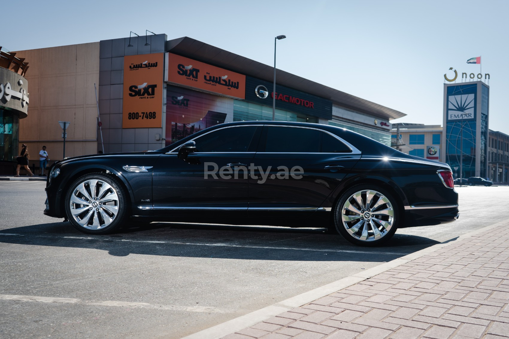 Black Bentley Flying Spur for rent in Sharjah 1